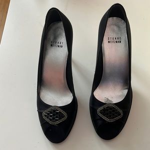 Stuart Weitzman black satin pumps with a diamond detailing